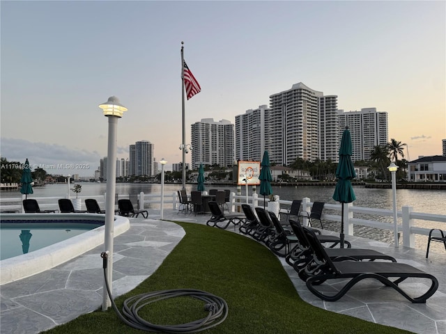 3209 S Ocean Dr Unit 2M, Hallandale Beach, FL 33009 - view of patio / terrace featuring a water view and a city view