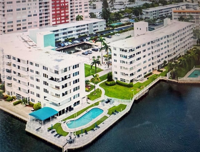 3209 S Ocean Dr Unit 2M, Hallandale Beach, FL 33009 - view of urban area with a pool, apartment complex / building, and a large body of water