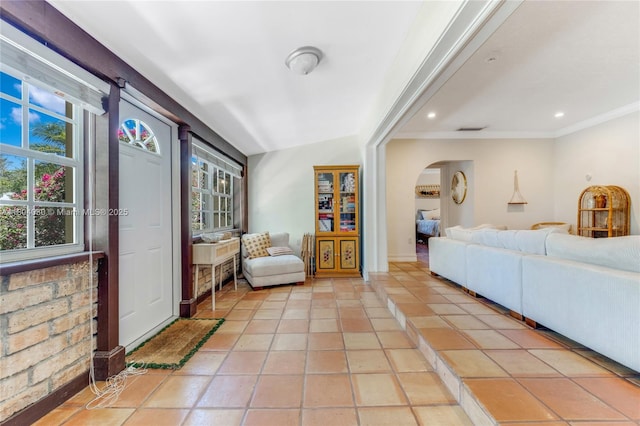 3610 SW 59th Ave, Miami, FL 33155 - living area with arched walkways, ornamental molding, light tile patterned floors, baseboards, and recessed lighting