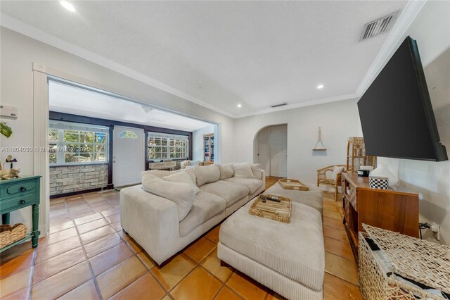 3610 SW 59th Ave, Miami, FL 33155 - living room featuring arched walkways, recessed lighting, ornamental molding, and light tile patterned floors