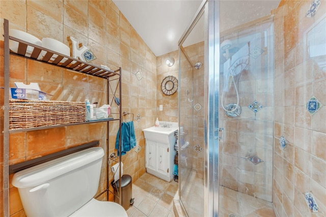 3610 SW 59th Ave, Miami, FL 33155 - full bathroom with tile walls, a shower stall, toilet, vanity, and tile patterned flooring