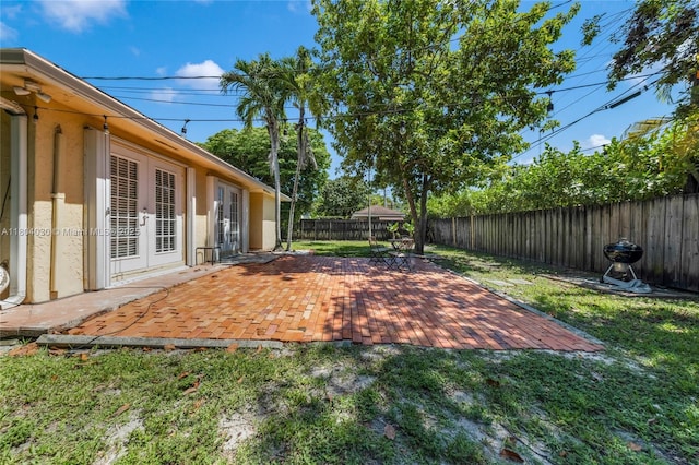 3610 SW 59th Ave, Miami, FL 33155 - view of yard with french doors and a patio area