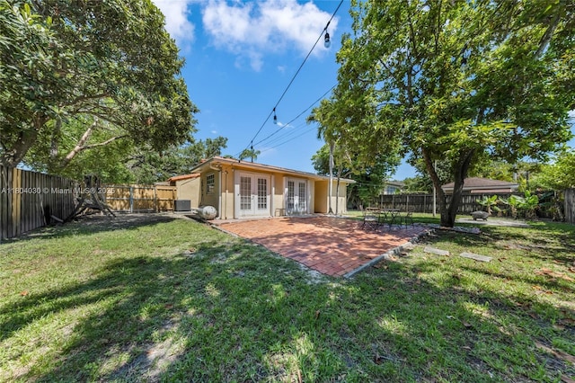 3610 SW 59th Ave, Miami, FL 33155 - back of house with french doors, stucco siding, and a patio area