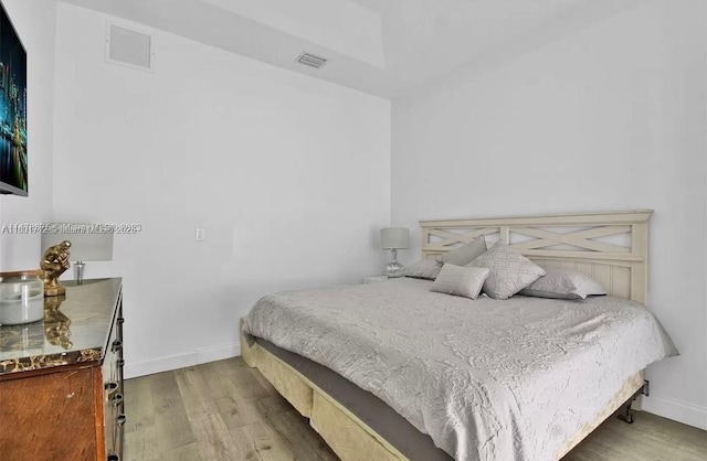 12202 SW 216th St, Miami, FL 33170 - bedroom featuring baseboards and wood finished floors