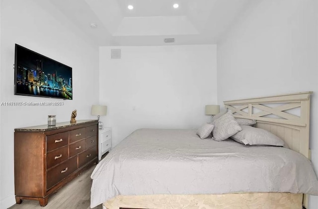 12202 SW 216th St, Miami, FL 33170 - bedroom featuring wood finished floors, recessed lighting, and a tray ceiling