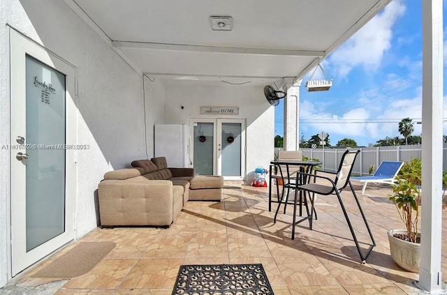 12202 SW 216th St, Miami, FL 33170 - view of patio / terrace with french doors and fence