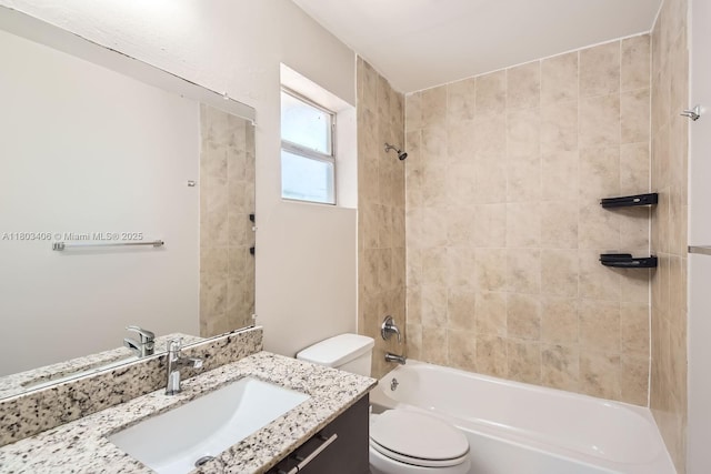 3226 NW 41st St, Lauderdale Lakes, FL 33309 - bathroom featuring toilet, vanity, and tub / shower combination