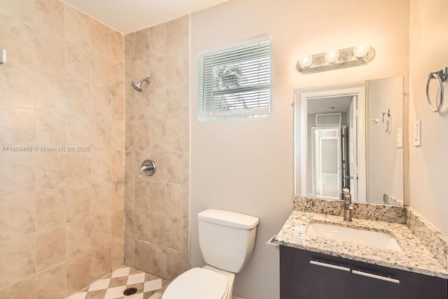 3226 NW 41st St, Lauderdale Lakes, FL 33309 - full bathroom with toilet, tiled shower, and vanity