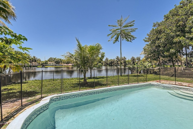 3226 NW 41st St, Lauderdale Lakes, FL 33309 - view of pool featuring a water view and a fenced backyard