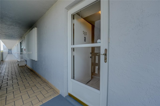 170 SE 5th Ave Unit 505, Dania Beach, FL 33004 - view of exterior entry with stucco siding