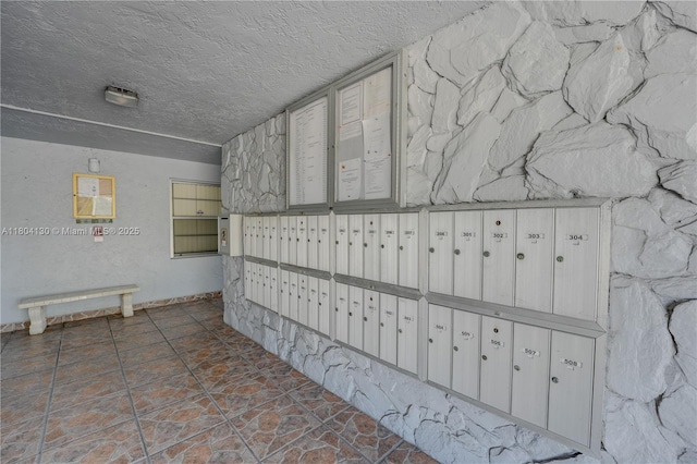 170 SE 5th Ave Unit 505, Dania Beach, FL 33004 - view of home's community featuring mail area and a textured ceiling