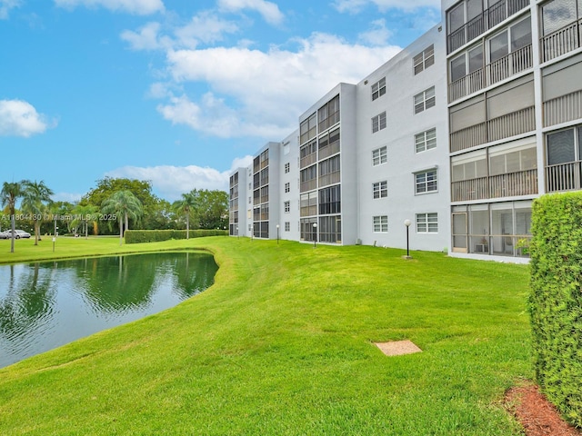 170 SE 5th Ave Unit 505, Dania Beach, FL 33004 - view of home's community featuring a water view and a yard