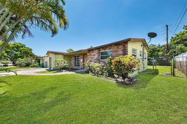 4240 NW 22nd St, Lauderhill, FL 33313 - view of front of house featuring stucco siding