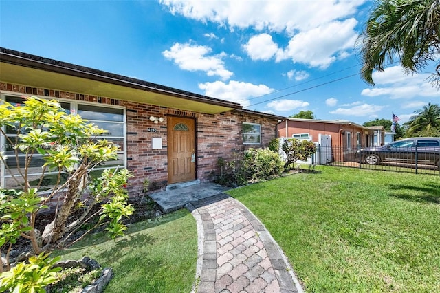 4240 NW 22nd St, Lauderhill, FL 33313 - property entrance with brick siding