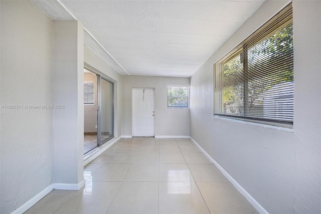 4240 NW 22nd St, Lauderhill, FL 33313 - full bath featuring healthy amount of natural light, tile walls, toilet, vanity, and bathing tub / shower combination
