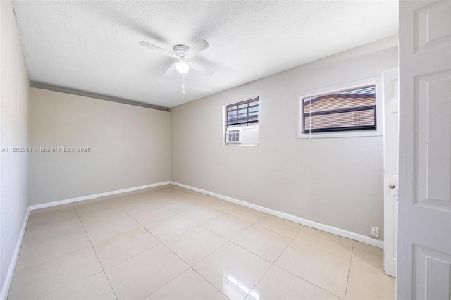 4240 NW 22nd St, Lauderhill, FL 33313 - unfurnished room featuring a ceiling fan, baseboards, a textured ceiling, and light tile patterned flooring