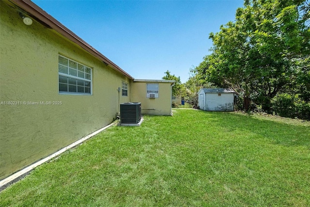4240 NW 22nd St, Lauderhill, FL 33313 - view of grassy yard featuring central AC and cooling unit