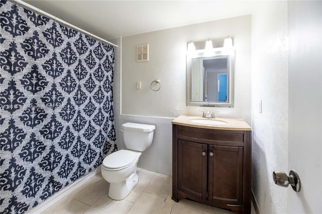 8693 SW 137th Ave Unit 8693, Miami, FL 33183 - bathroom featuring toilet, tile walls, tile patterned floors, vanity, and curtained shower