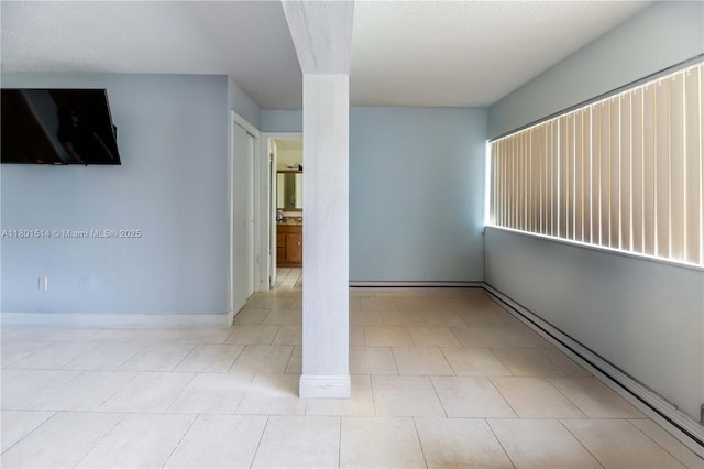 8693 SW 137th Ave Unit 8693, Miami, FL 33183 - spare room featuring baseboards and tile patterned floors