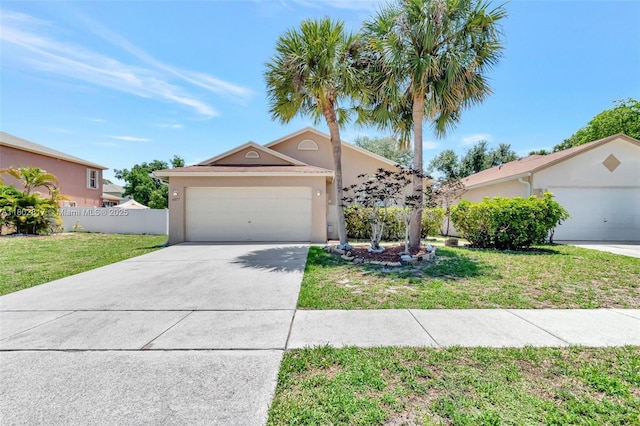 6077 Azalea Cir, West Palm Beach, FL 33415 - view of front of home with stucco siding, a garage, and driveway