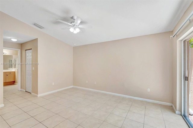 6077 Azalea Cir, West Palm Beach, FL 33415 - spare room with ceiling fan, baseboards, and light tile patterned flooring