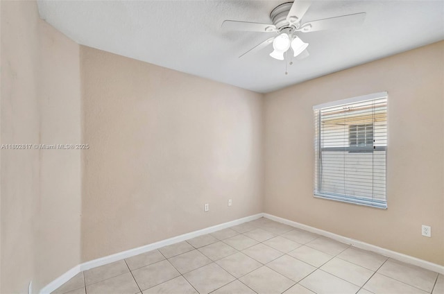 6077 Azalea Cir, West Palm Beach, FL 33415 - unfurnished room featuring ceiling fan, baseboards, and light tile patterned flooring