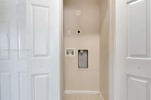 6077 Azalea Cir, West Palm Beach, FL 33415 - laundry room with electric dryer hookup, hookup for a washing machine, baseboards, and tile patterned flooring