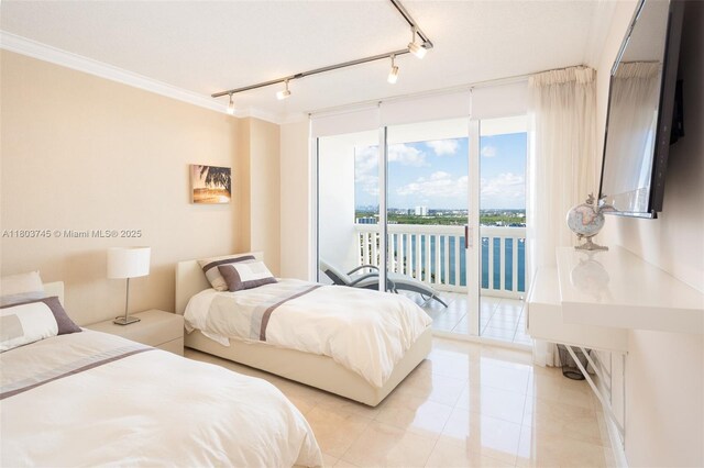 1000 W Island Blvd Unit 2707, Aventura, FL 33160 - bedroom featuring access to outside, light tile patterned floors, ornamental molding, and track lighting