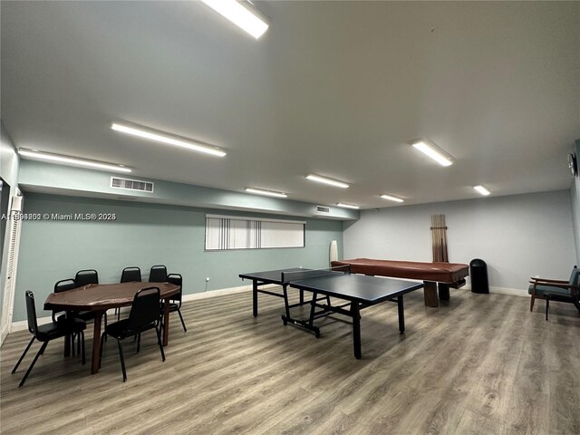601 Ives Dairy Rd Unit 401-8, Miami, FL 33179 - game room featuring light wood-type flooring and baseboards