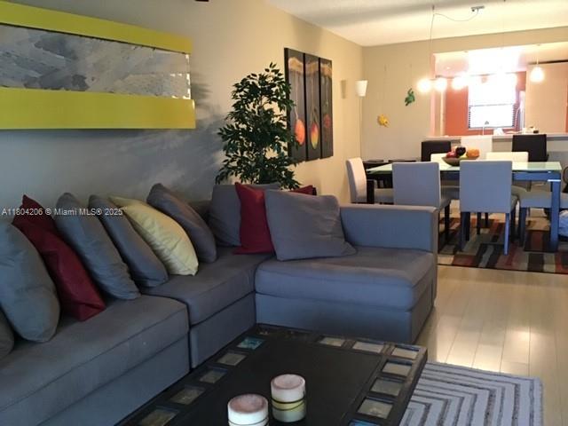 16141 Blatt Blvd Unit 311, Weston, FL 33326 - living area featuring wood finished floors
