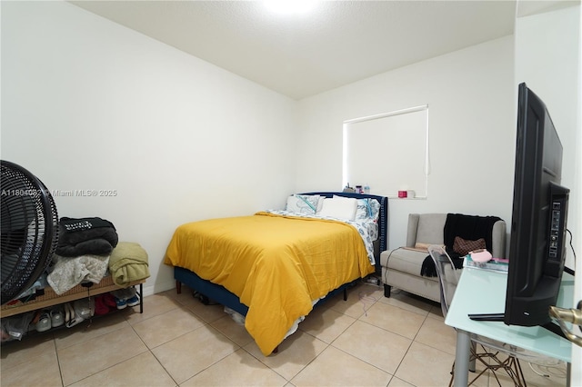 5271 SW 8th St Unit 311, Miami, FL 33134 - bedroom with light tile patterned floors