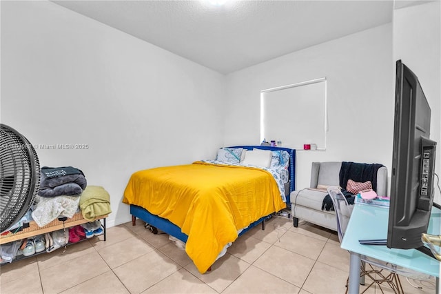 5271 SW 8th St Unit 311, Miami, FL 33134 - bedroom featuring light tile patterned floors