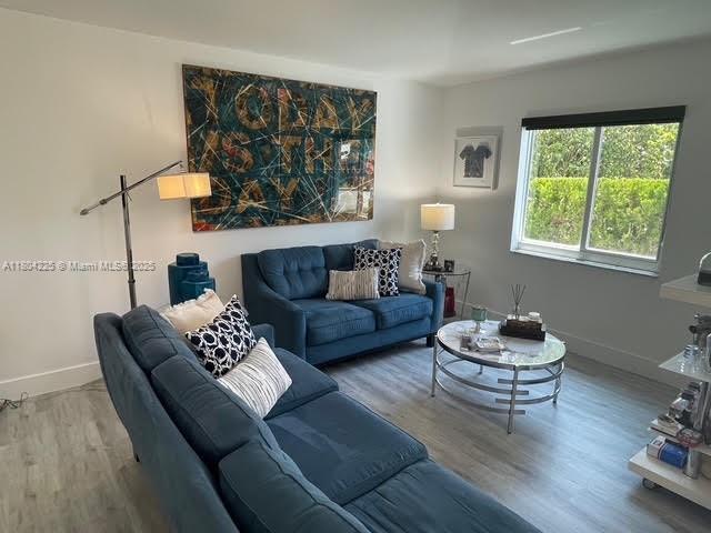 17201 SW 143rd Ct, Miami, FL 33177 - living room with wood finished floors and baseboards