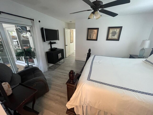 17201 SW 143rd Ct, Miami, FL 33177 - bedroom with wood finished floors, baseboards, and a ceiling fan