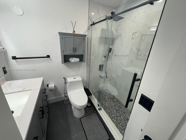 17201 SW 143rd Ct, Miami, FL 33177 - full bath with toilet, a marble finish shower, vanity, and baseboards
