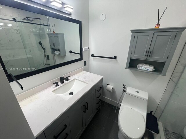 17201 SW 143rd Ct, Miami, FL 33177 - bathroom with a marble finish shower, toilet, and vanity