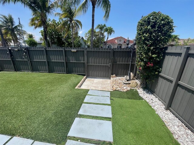 17201 SW 143rd Ct, Miami, FL 33177 - view of yard featuring a gate