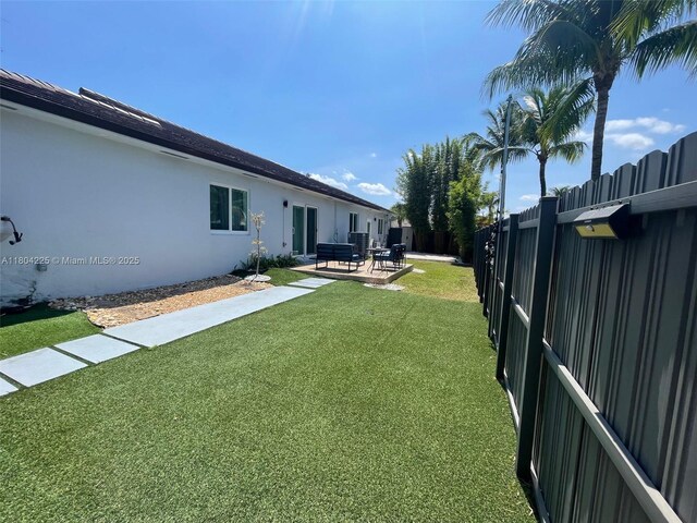 17201 SW 143rd Ct, Miami, FL 33177 - view of yard featuring a patio