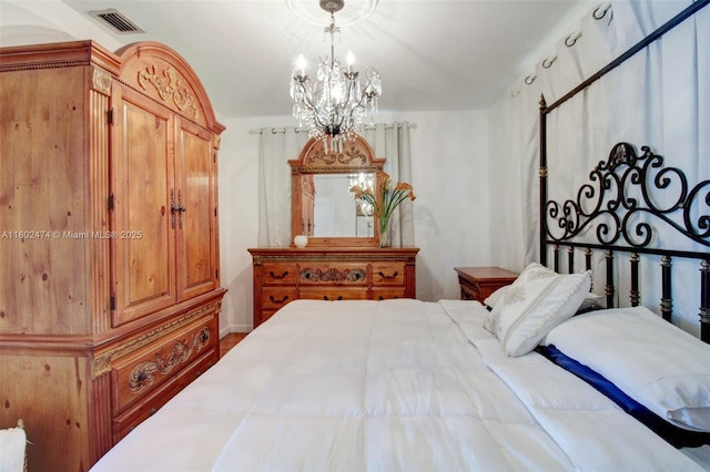 928 W 31st St, Hialeah, FL 33012 - bedroom with a chandelier