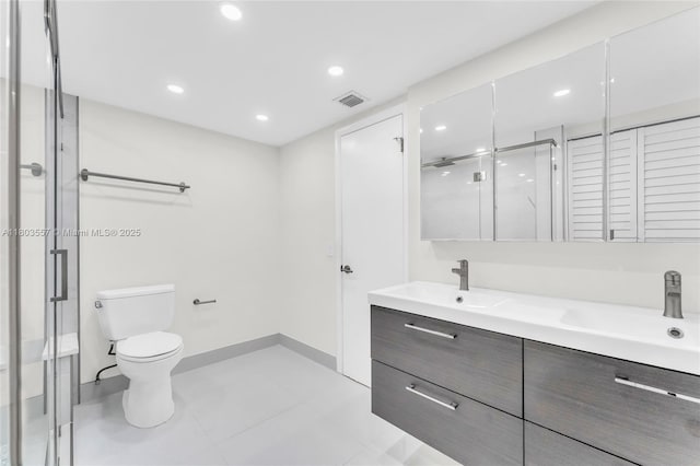 full bath with a stall shower, toilet, vanity, baseboards, and recessed lighting