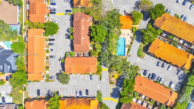 drone / aerial view of a pool