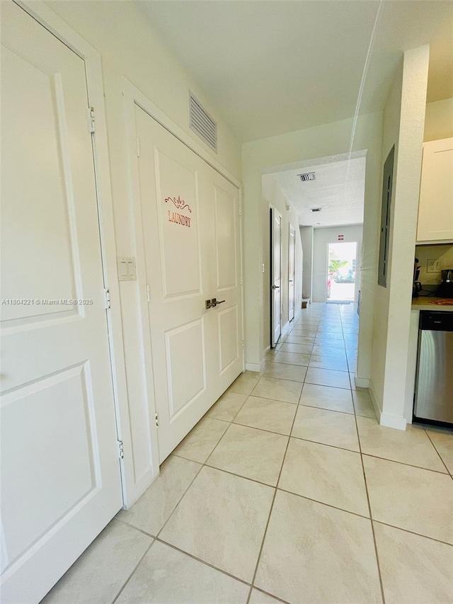 448 NE 4th St, Florida City, FL 33034 - corridor featuring light tile patterned floors and baseboards