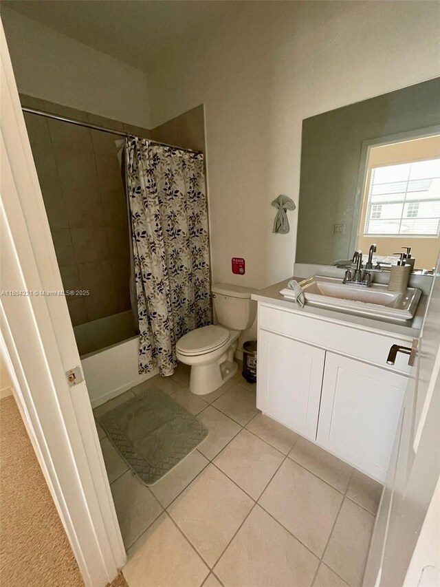 448 NE 4th St, Florida City, FL 33034 - bathroom with tile patterned flooring, toilet, vanity, and shower / bath combination with curtain