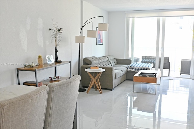 947 Lenox Ave Unit 504, Miami Beach, FL 33139 - living room featuring light marble finish floors
