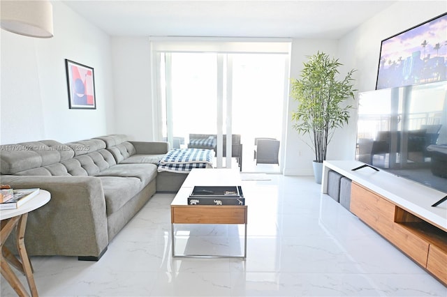 947 Lenox Ave Unit 504, Miami Beach, FL 33139 - living area featuring light marble finish flooring
