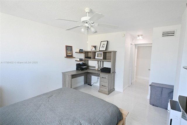 947 Lenox Ave Unit 504, Miami Beach, FL 33139 - bedroom featuring light marble finish flooring, an office area, and a ceiling fan