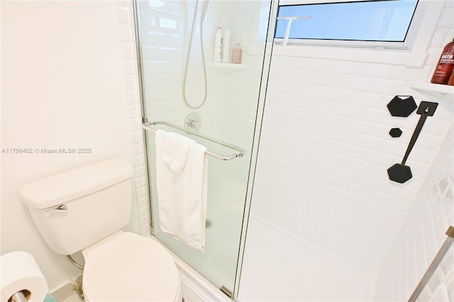 947 Lenox Ave Unit 504, Miami Beach, FL 33139 - full bathroom featuring a stall shower and toilet