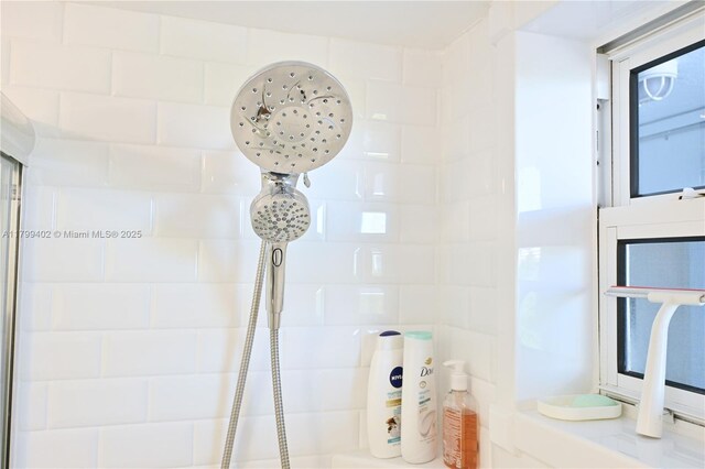 947 Lenox Ave Unit 504, Miami Beach, FL 33139 - bathroom featuring tiled shower