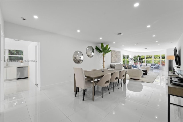 3020 Alton Rd, Miami Beach, FL 33140 - dining area featuring recessed lighting, baseboards, and light tile patterned floors