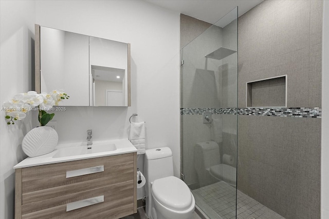 3020 Alton Rd, Miami Beach, FL 33140 - full bathroom featuring toilet, a stall shower, and vanity